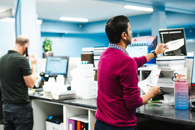 busy pharmacy with friendly staff